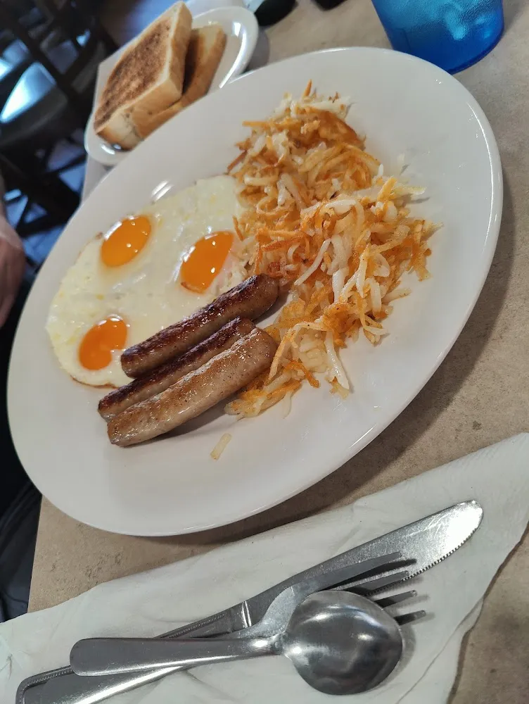Two Eggs & Hash Browns & Toast or Pancakes
